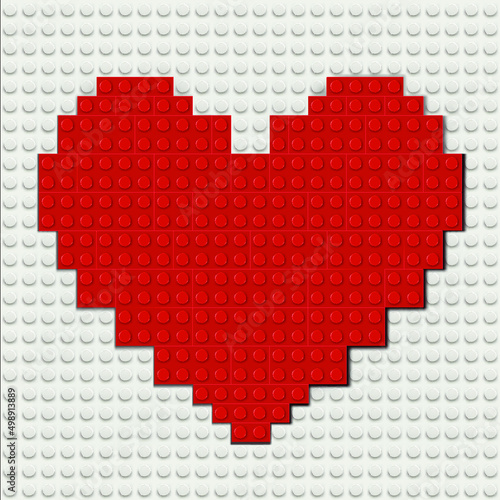 Vector realistic illustration of red heart from plastic bricks on white baseplate