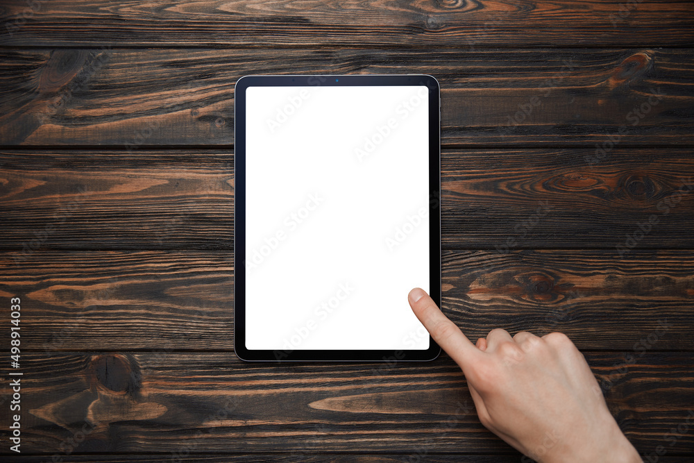 man touching the screen of a Tablet pc. man touching the screen of a Tablet pc.