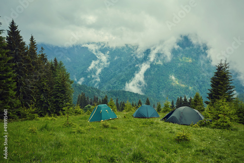 Camping on the holiday. Camping on the grass. Camping on the mountain fog beautiful sea view.