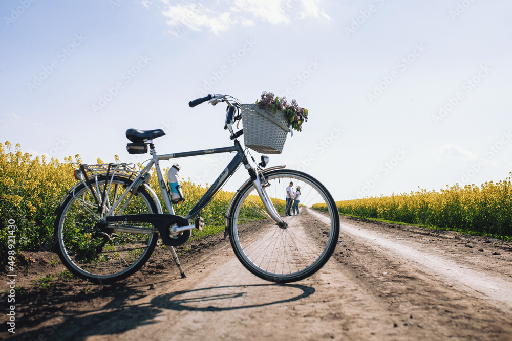 rapeseed and bicycle field and lovers rapeseed and bicycle field and lovers