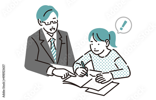 学習塾で勉強をする小学生の女の子