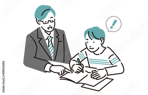 学習塾で勉強をする小学生の男の子