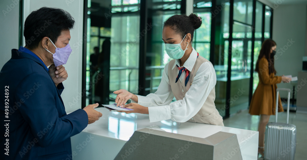 travel transport tourists on vacation.employees stand to sell tickets to tourists.students leave for the airport to wait for their flight. travel transport tourists on vacation.employees stand to sell tickets to tourists.students leave for the airport to wait for their flight.