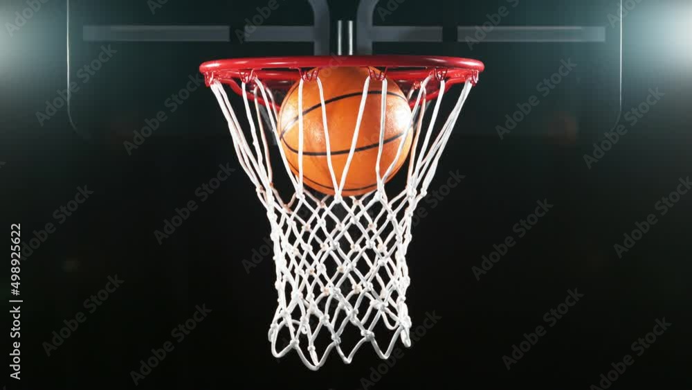 Super slow motion of basketball ball hitting the basket. Filmed on high speed cinema camera, 1000fps. Super slow motion of basketball ball hitting the basket. Filmed on high speed cinema camera, 1000fps.
