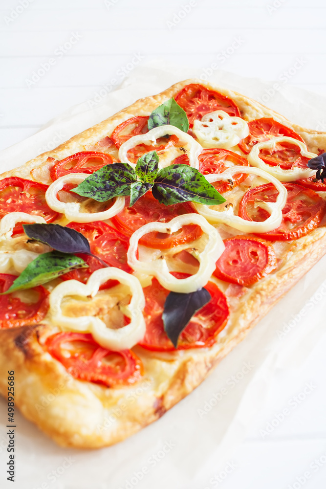 Ruddy rectangle pizza bacon white wooden background selective focus. Ruddy rectangle pizza bacon white wooden background selective focus.