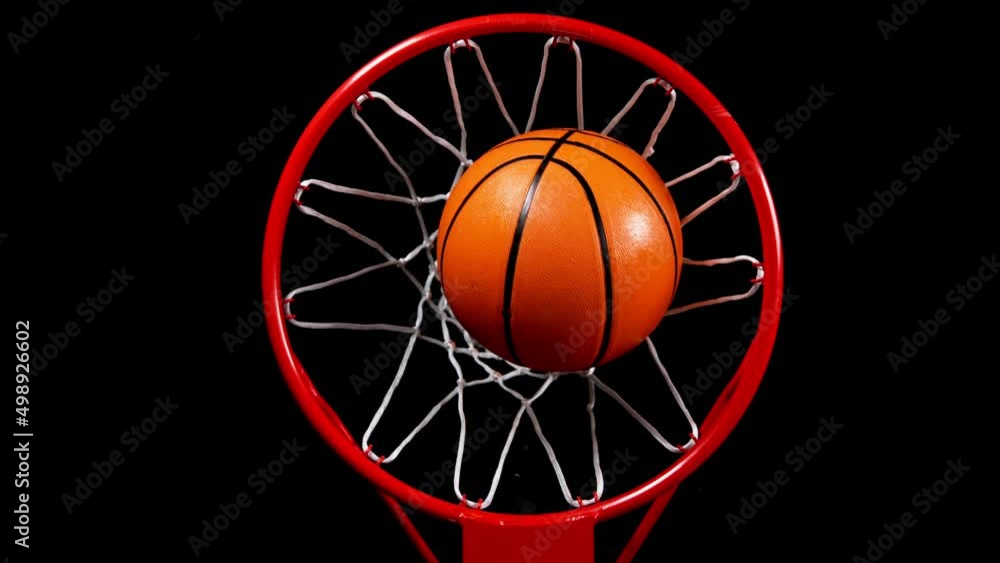 Super slow motion of basketball ball hitting the basket. High angle of view. Filmed on high speed cinema camera, 1000fps. Super slow motion of basketball ball hitting the basket. High angle of view. Filmed on high speed cinema camera, 1000fps.