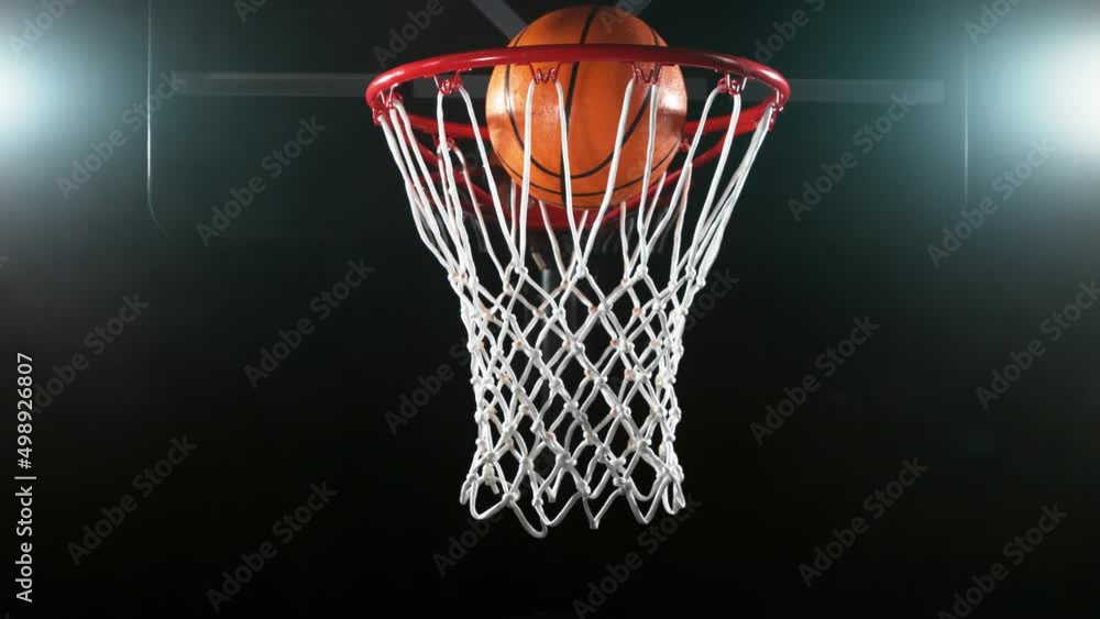 Super slow motion of basketball ball hitting the basket. Filmed on high speed cinema camera, 1000fps. Super slow motion of basketball ball hitting the basket. Filmed on high speed cinema camera, 1000fps.