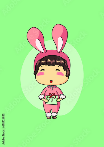 A kawaii cartoon drawing of a girl dressed as a pink bunny holding a present on a lettuce background.