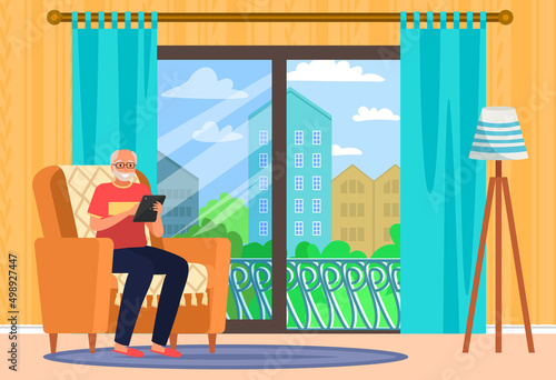 Happy old man sitting on armchair with tablet. Elderly person has modern lifestyle with technology. Senior spends time with electronic gadget at home. Retired male character surfing Internet