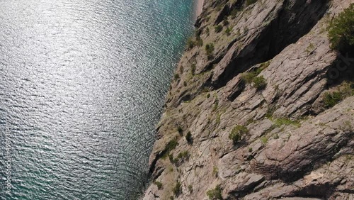 View from the cliff to Lake Baikal from the air on a sunny summer day. photo