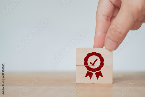 Konstfotografi businessman's hand completed sign of top service quality assurance, guarantee, s