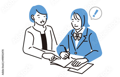 学習塾で勉強をする高校生の女の子