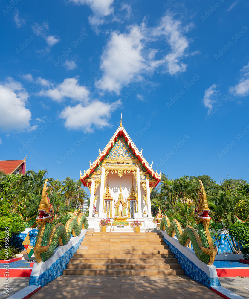 Beautiful Wat Karon Buddhist temple travel summer trip famous landmark in Thailand. 