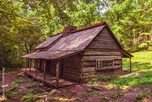 old log cabin in forest, Noah Bug Ogle Farm in Smoky Mountain National Park.