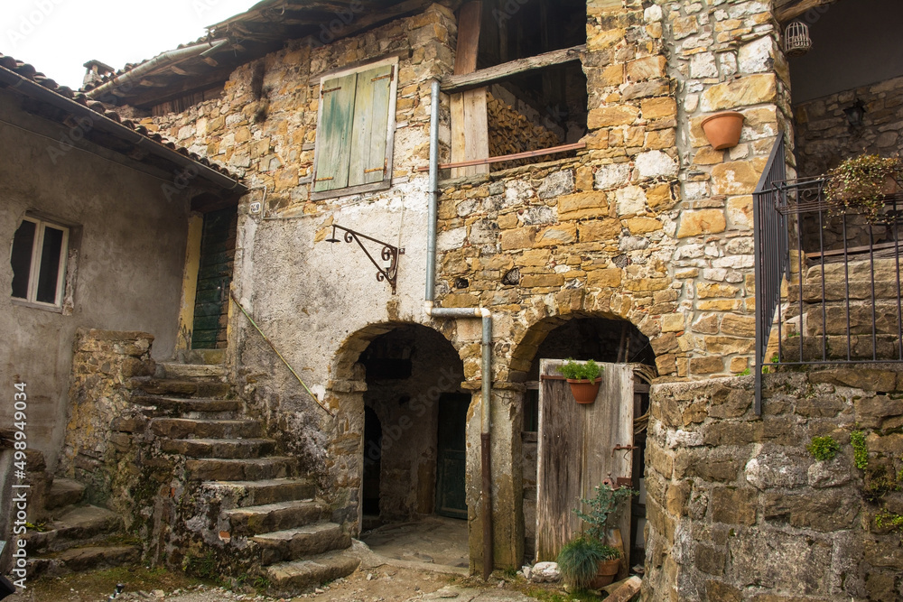 Historic disused residential buildings in Poffabro, a medieval village in the Val Colvera valley in Pordenone province, Friuli-Venezia Giulia, north east Italy
