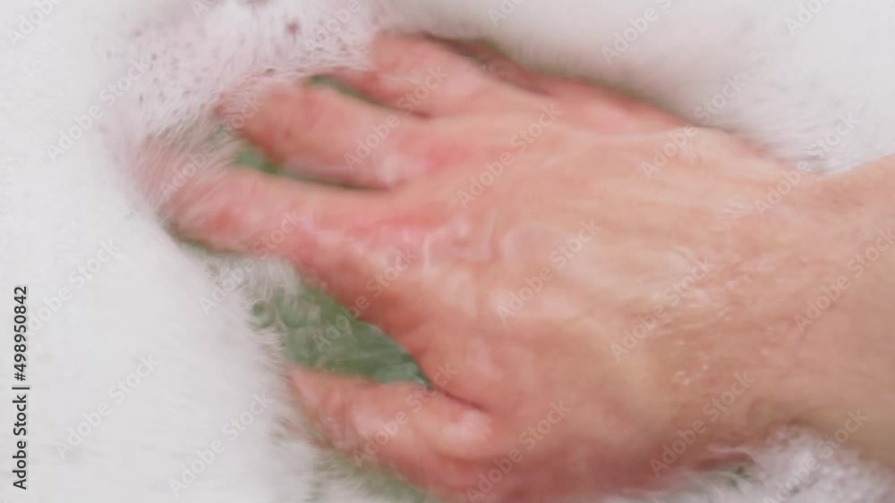 Soap foam. Foam in a green basin. Water with foam. Soap foam. Foam in a green basin. Water with foam.