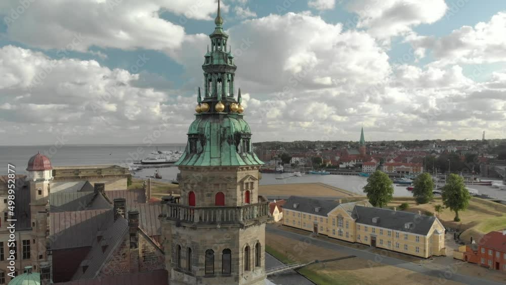Cinematic 4K aerial drone reveal shot of Kronborg Slot Castle, one of UNESCO's World Heritage sites, Helsingør city and Marina in in Denmark Cinematic 4K aerial drone reveal shot of Kronborg Slot Castle, one of UNESCO's World Heritage sites, Helsingør city and Marina in in Denmark
