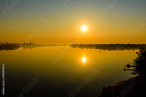 Fog above the water surface. Sunrise at the river Dnieper in Kremenchug, Ukraine