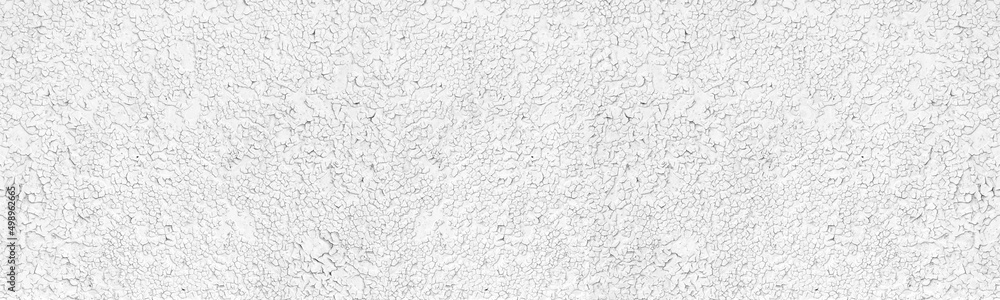 Old cracked white paint wide panoramic texture. Whitewashed weathered exterior wall grungy backdrop. Abstract grunge vintage light grey background Old cracked white paint wide panoramic texture. Whitewashed weathered exterior wall grungy backdrop. Abstract grunge vintage light grey background