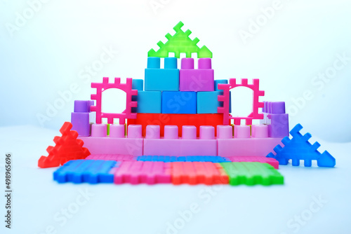 Colorful children's toys block puzzles. Disassembly of children's toys