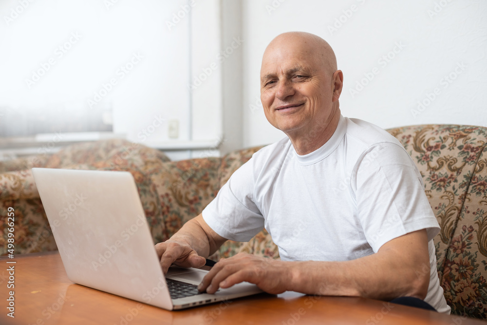 Old kind grandfather trying to use alone the internet. Old kind grandfather trying to use alone the internet.