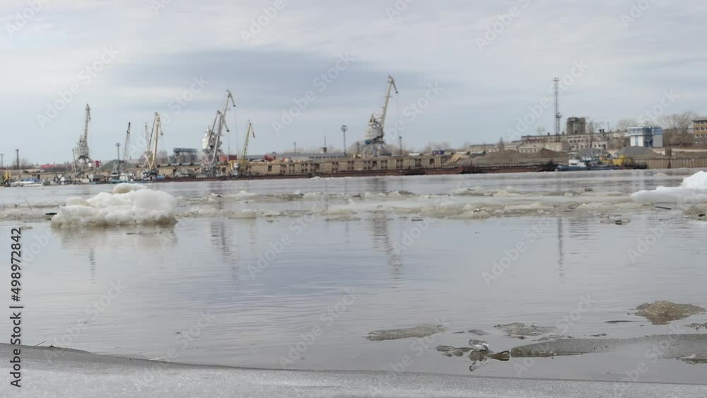Spring ice on the river 2022. View from the river embankment. High quality 4k footage Spring ice on the river 2022. View from the river embankment. High quality 4k footage