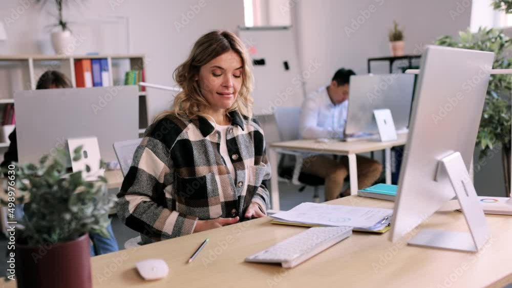 Attractive office worker secretly takes out a joystick while she working and begin to play video games. Excited businesswoman have fun in the office. . High quality 4k footage Attractive office worker secretly takes out a joystick while she working and begin to play video games. Excited businesswoman have fun in the office. . High quality 4k footage