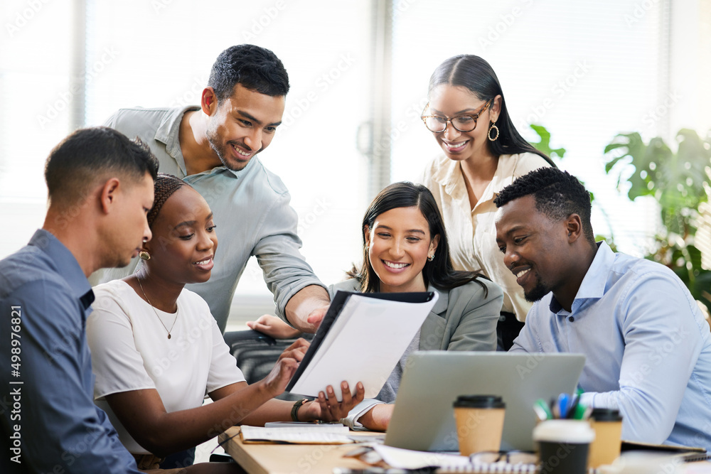 This is where ideas become reality. Cropped shot of a diverse group of businesspeople sitting in the boardroom during a meeting. This is where ideas become reality. Cropped shot of a diverse group of businesspeople sitting in the boardroom during a meeting.