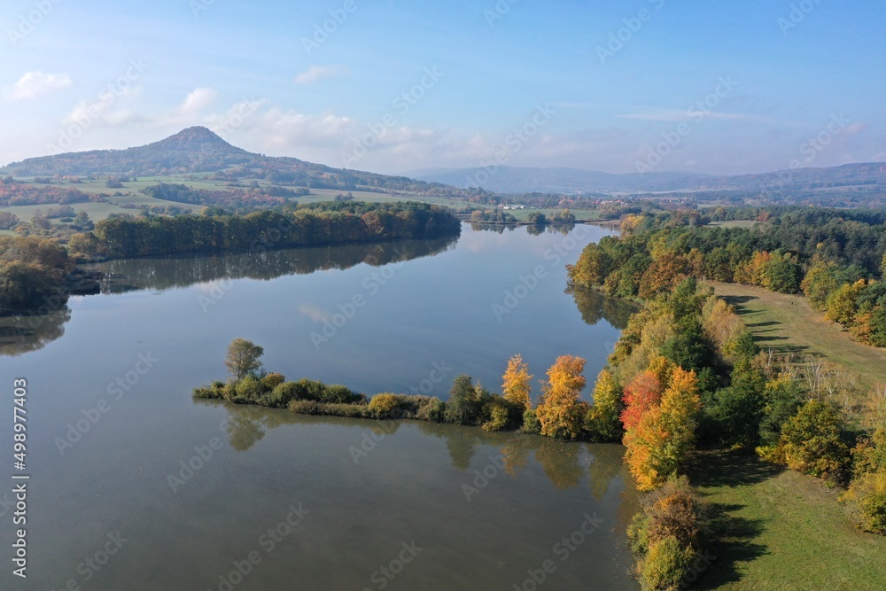 Lakes and ponds by the colorful trees on autumn in Bohemia nature
