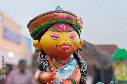 Colorful dolls made of clay, Chinese man, handicrafts on display during the Handicraft Fair in Kolkata , earlier Calcutta, West Bengal, India. It is the biggest handicrafts fair in Asia.