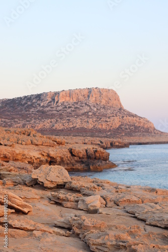 Rock formations near the beach with soft sunset light
