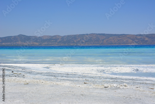 salda lake or turkish maldives with blue water and white sand and clear sky