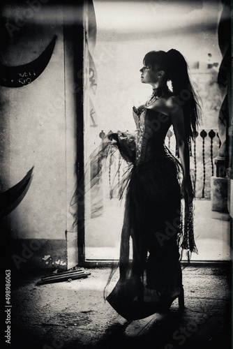 Performance Mujer en castillo gótico   photo