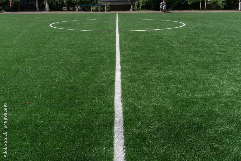 Marking on a modern stadium with artificial turf. School stadium.