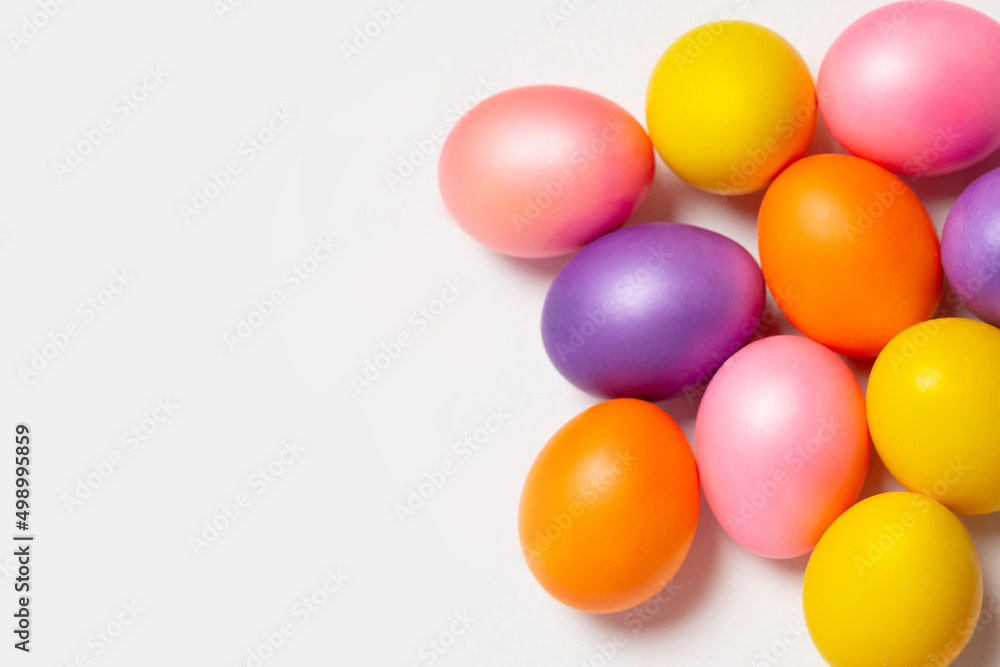 Colored Easter eggs isolated on white background. Flat lay, background, layout, top view, template.