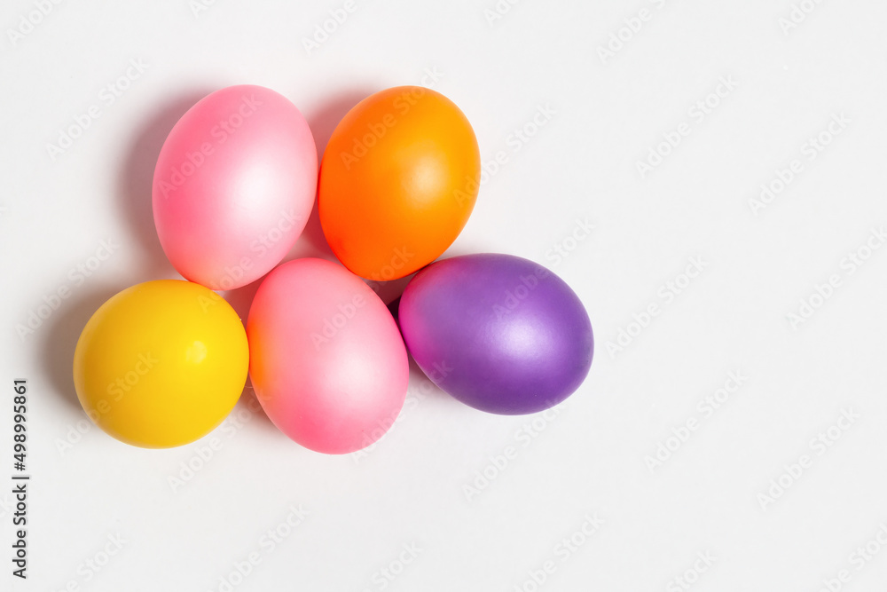Colored Easter eggs isolated on white background. Flat lay, background, layout, top view, template. Colored Easter eggs isolated on white background. Flat lay, background, layout, top view, template.