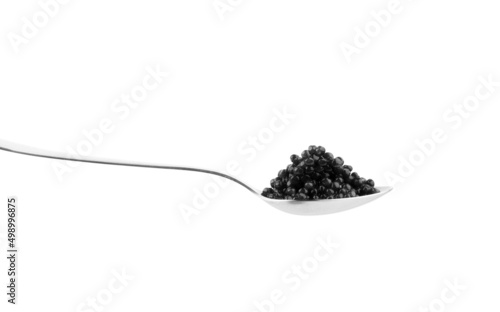 Black caviar and spoon, isolated on white