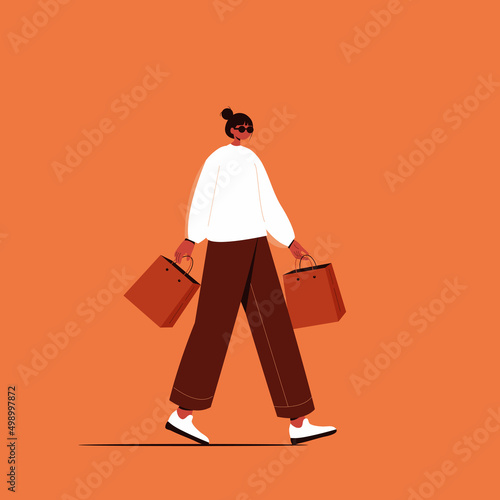 Woman carrying shopping bags vector illustration. 