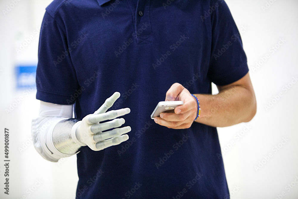 Athlete equipped with a bionic hand or robotic prosthesis. Athlete equipped with a bionic hand or robotic prosthesis.