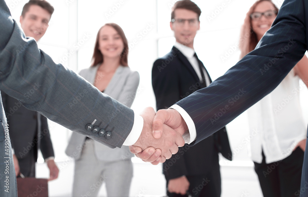 close up.handshake business partners in the office. close up.handshake business partners in the office.