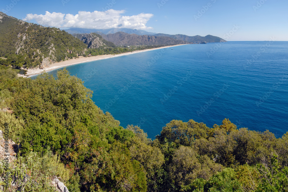 View of Olympos - Chiraly beach and Mediterranean Sea on sunny summer day. Turkey.