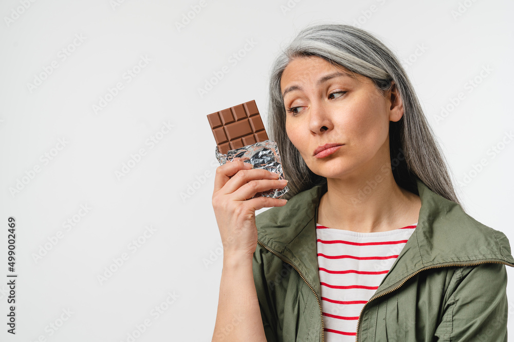 Dieting, gaining weight with calories. Unhealthy junk food. Mature