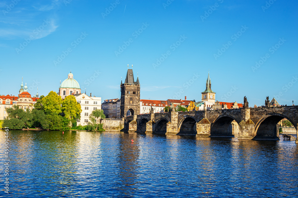 Old town with Charles Bridge with bridge tower on Vltava river in Prague, Czech Republic