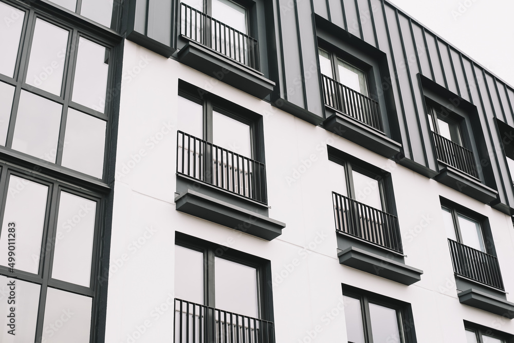 Exterior of modern apartment buildings. Abstract geometric background of modern architecture Exterior of modern apartment buildings. Abstract geometric background of modern architecture
