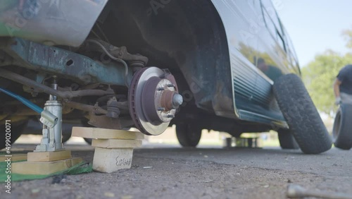 Man Changes Tire - Slow Motion