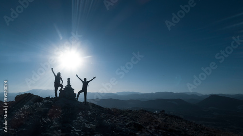 Celebrating success together on the peaks of challenging mountains