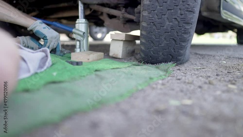 Man Changes Tire - Slow Motion