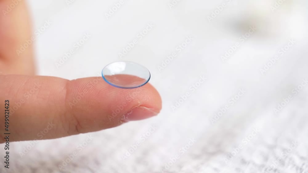 close-up. contact lens on a child's finger. close-up. contact lens on a child's finger.