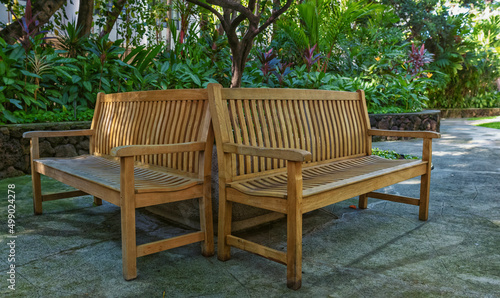 Oak Benches in a Shaded Garden.