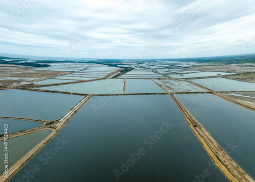 Pools for raising shrimp, shrimp industry in Peru. Aerial view of a commercial prawn farm project